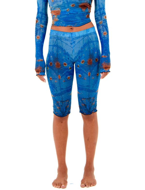 Gianni Capri in Ocean colorway, front view, showcasing signature thigh tattoo design and body-contouring fit