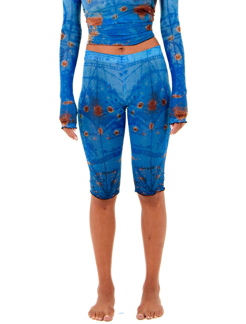 Gianni Capri in Ocean colorway, front view, showcasing signature thigh tattoo design and body-contouring fit