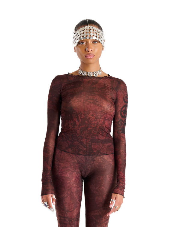 Sheer cropped long sleeve Demi Top with signature allover abstract print, front view