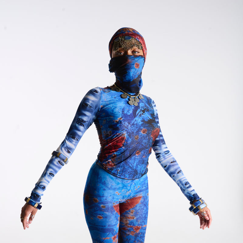 Sheer cropped long sleeve Demi Top in OCEAN with signature allover abstract print, front view pose