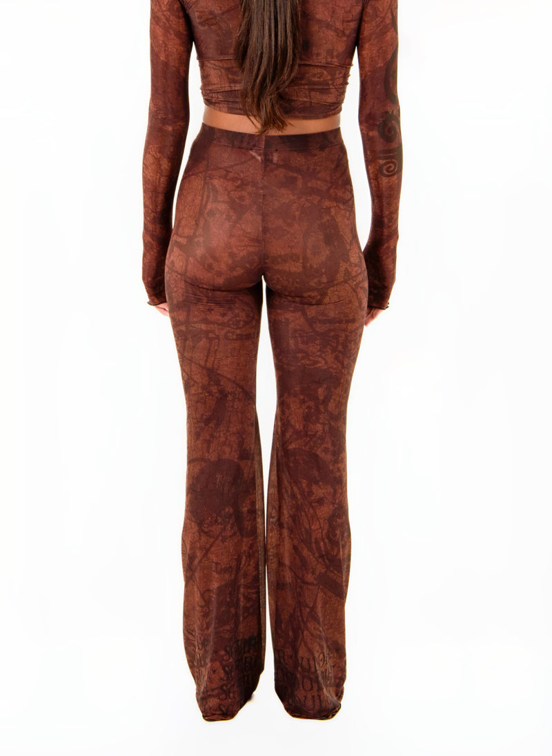 Sheer wide-leg Donatella Trouser in EARTH showing drape and abstract print, back view
