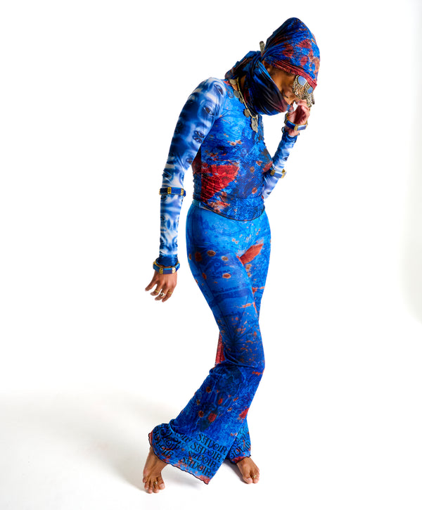 Model wearing Donatella Trouser in OCEAN paired with Demi Top, showcasing flowing wide-leg silhouette